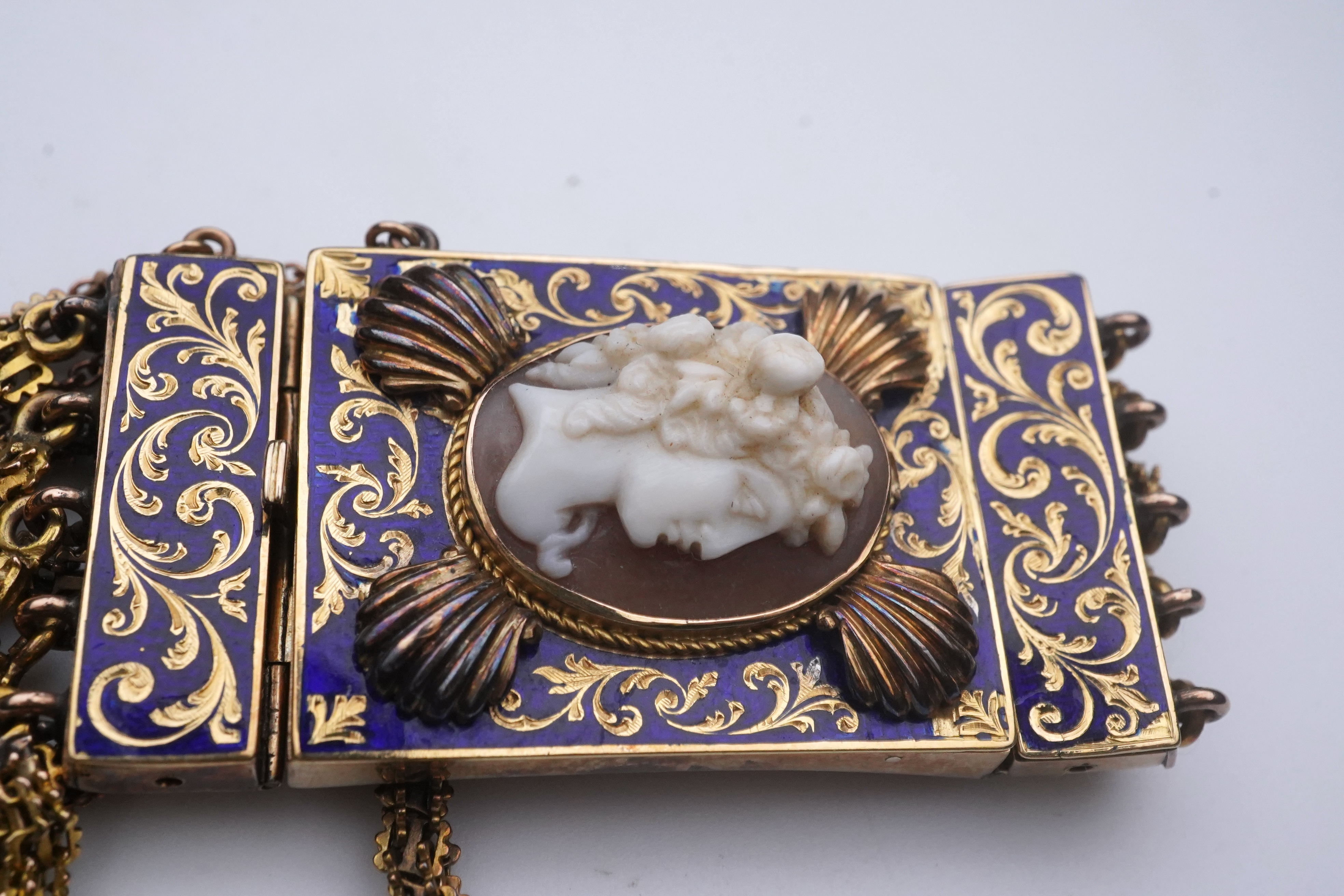 A Victorian shell cameo and enamel bracelet, late 19th century